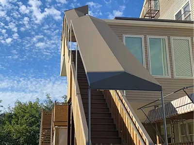 Staircase area with elegant awning installation